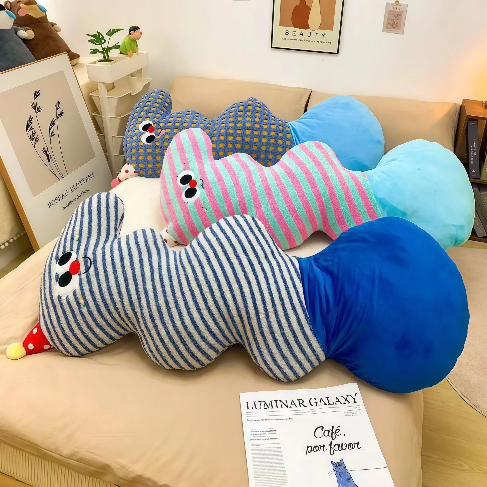 Core keywords: body pillow, Anxiety Relief Toy, How to find inner peace. Three S-shaped plush body pillows for children (Specification: long cylindrical) are lined up on a bed: blue/white stripes, pink/blue stripes, and blue/yellow checkerboard. The front blue/white striped version has a large round dark blue bottom. These therapeutic plush toys can help you how to find inner peace, pay attention to your emotions, and may be a best sleep aid for dementia patients.