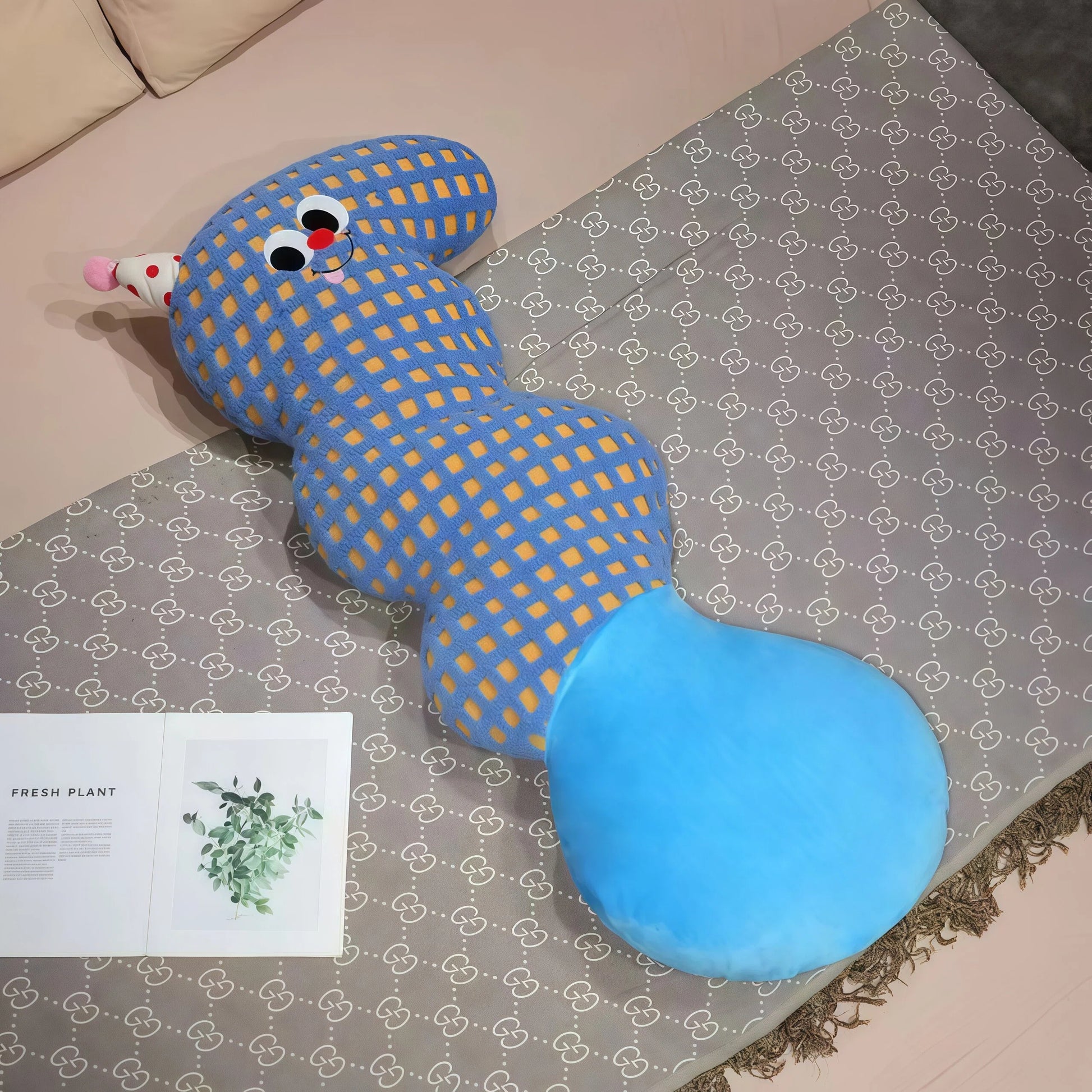 Core keywords: body pillow, natural sleep aid, How to clean pillows?. An S-shaped plush body pillow for children (Specification: long cylindrical) with multi-colored polka dots on a plain white background, featuring a red conical party hat on the head and a large round yellow bottom. This cartoon pillow serves as a natural sleep aid and helps with how to help your baby fall asleep quickly. The detail page should guide users on how to clean pillows?