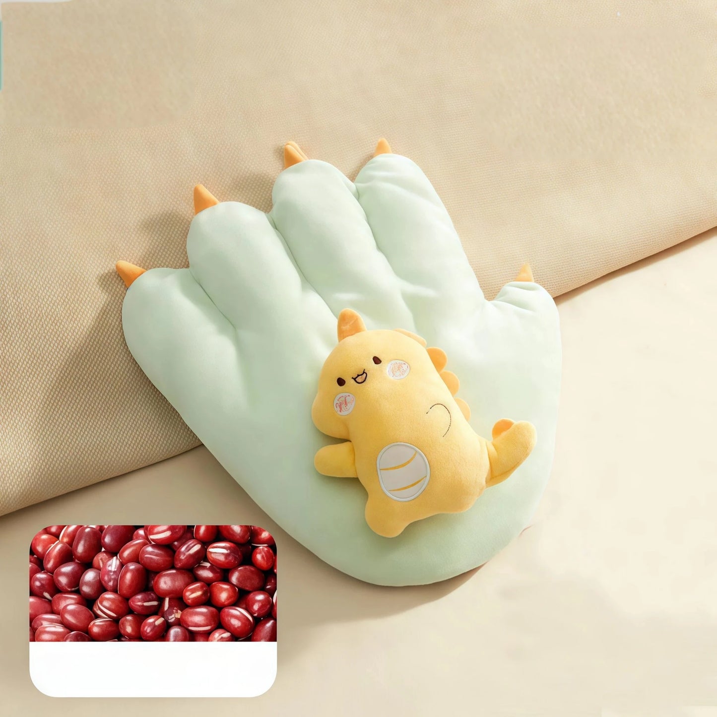 Moihug Green Dinosaur Cartoon Palm Pillow: Green plush material with details on the red bean filling. This innovative sleep aid device is designed to help you How to find inner peace and Soothe your negative emotions. If you wonder How to clean pillows?, its modular design makes it easy. It’s a great stress relief toy for anxiety.